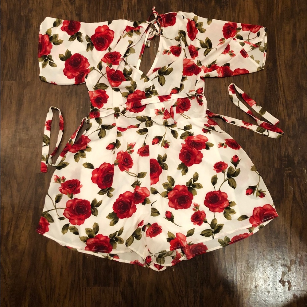Trixxi floral romper size L